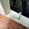 5/8" bolts welded to the trailer below.