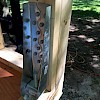 Installing HDU5 hold-downs onto the trailer rods.