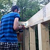 Constructing the cantelevered overhang and getting ready to push it out into position.