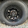 What one of my wheels looked like after scraping off the loose paint.