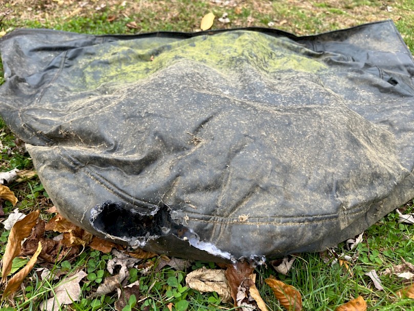 What was left of the tire covers after the mice got to them. They chewed holes right through them and used the fluffy insulation for nesting material.